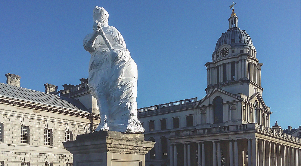 John Michael Rysbrack's George II (1735) in the Grand Square of the Greenwich Hospital, wraped in white fabric